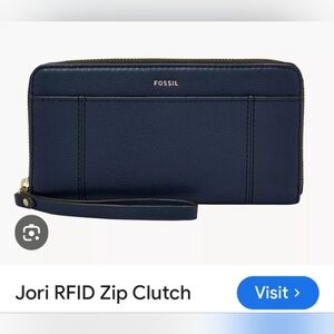 Fossil Black Leather Wristlet with Gold Accent.